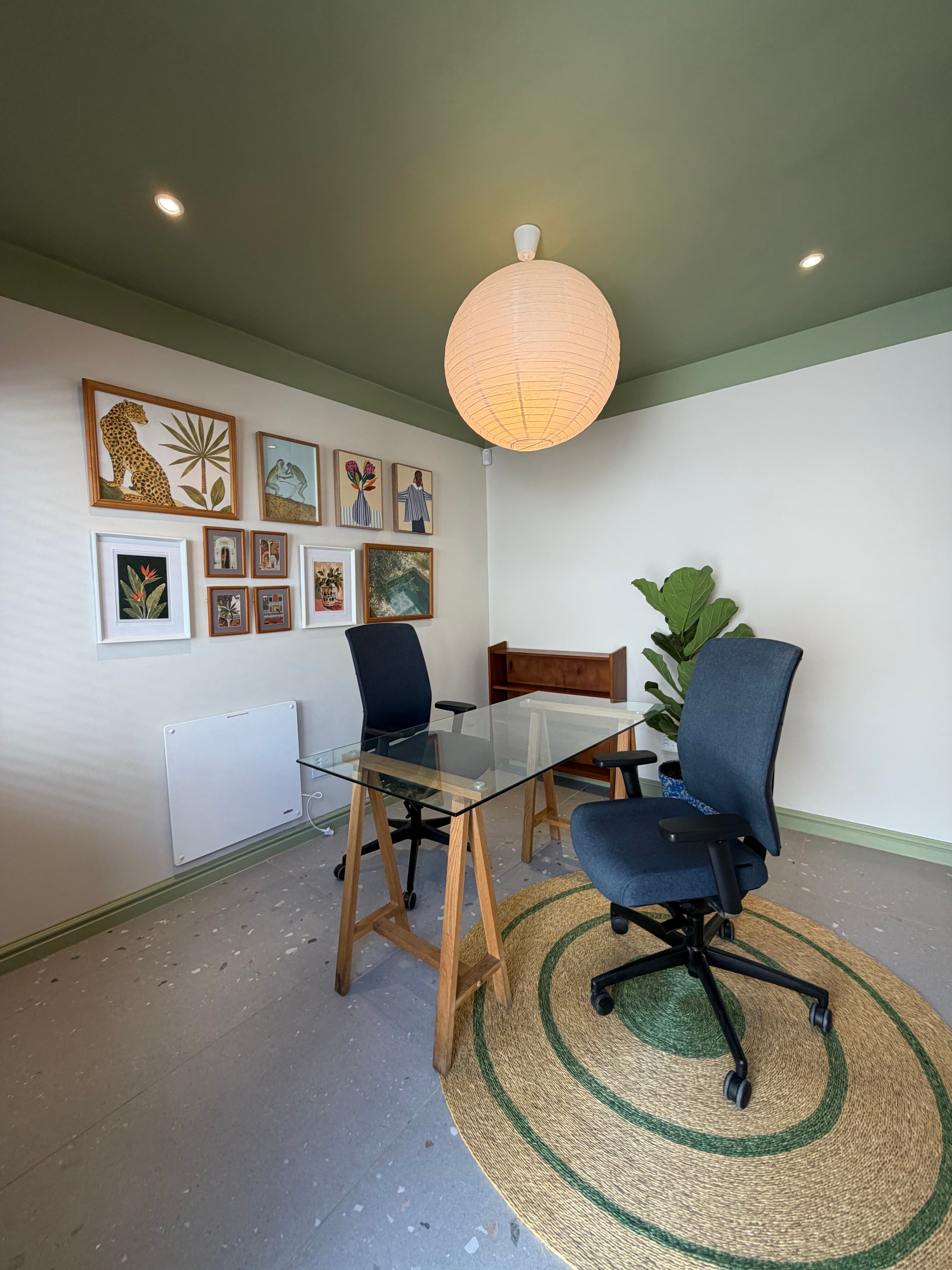 Contemporary two-person private office with natural light and a clean, understated finish. Contemporary two-person private office with natural light and a clean, understated finish.