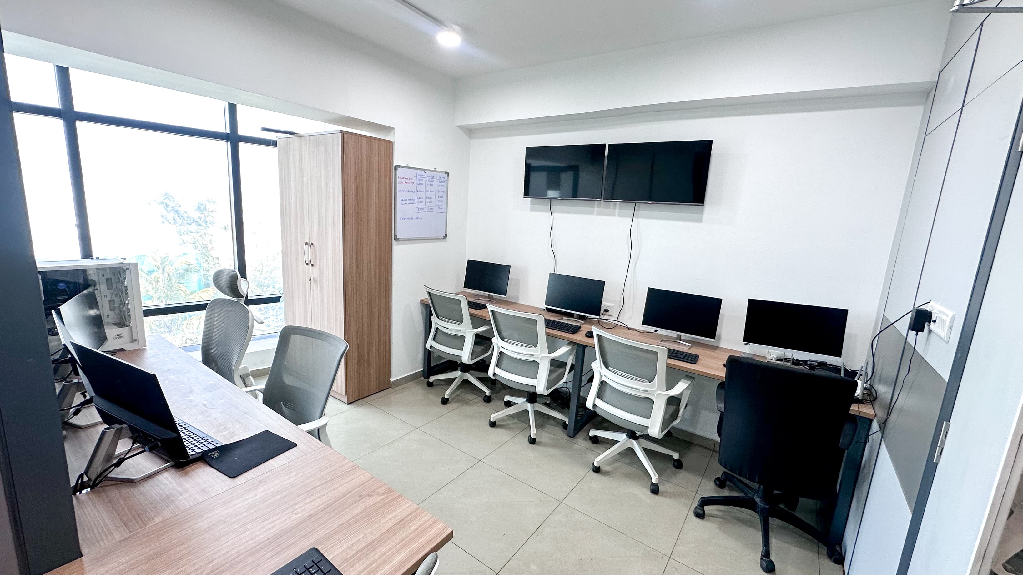 A shared workspace designed for collaboration and networking, offering comfortable seating and an open environment where memb