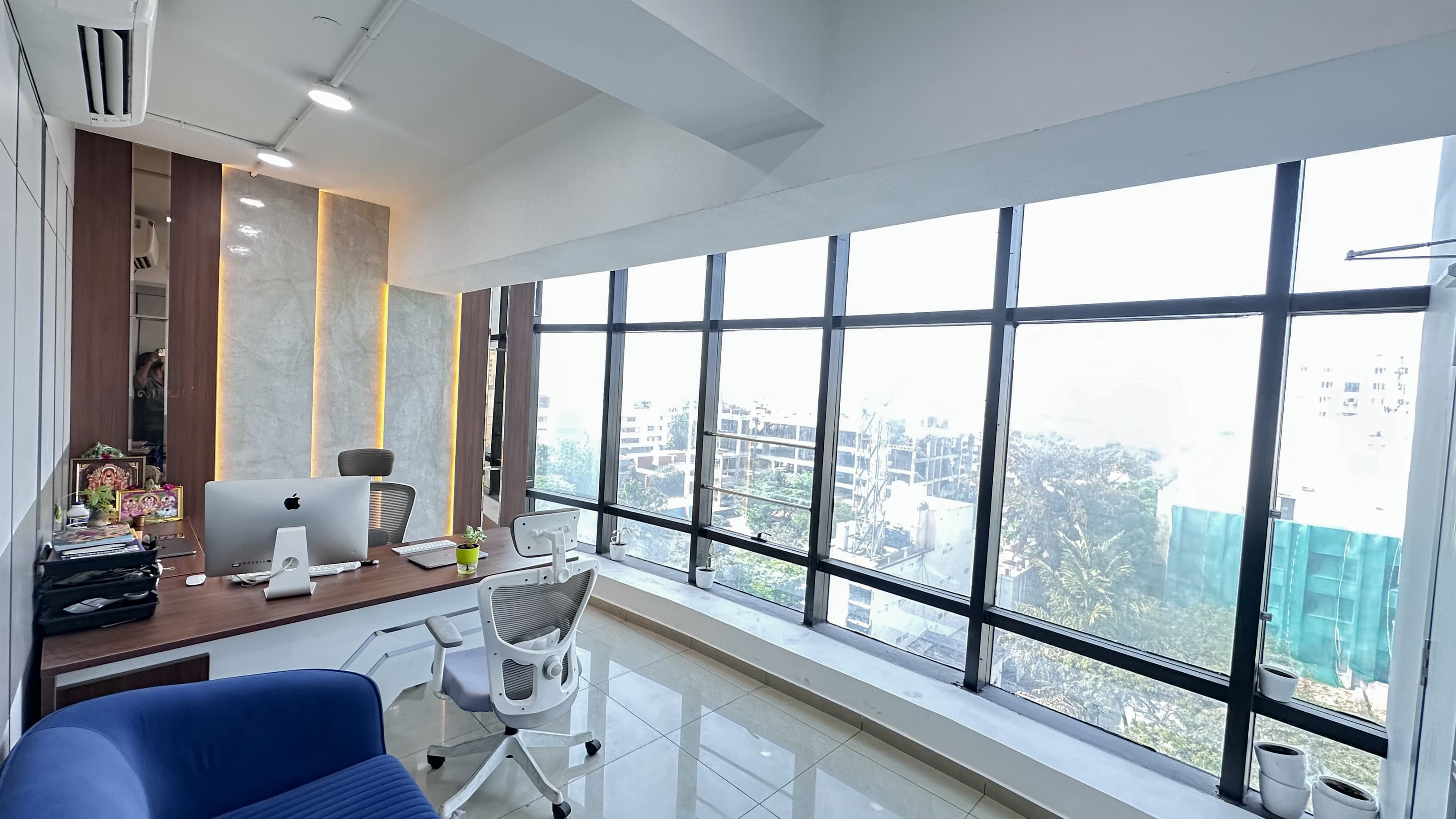 A private and comfortable cabin designed for small teams or professionals, offering a quiet workspace with ergonomic seating,