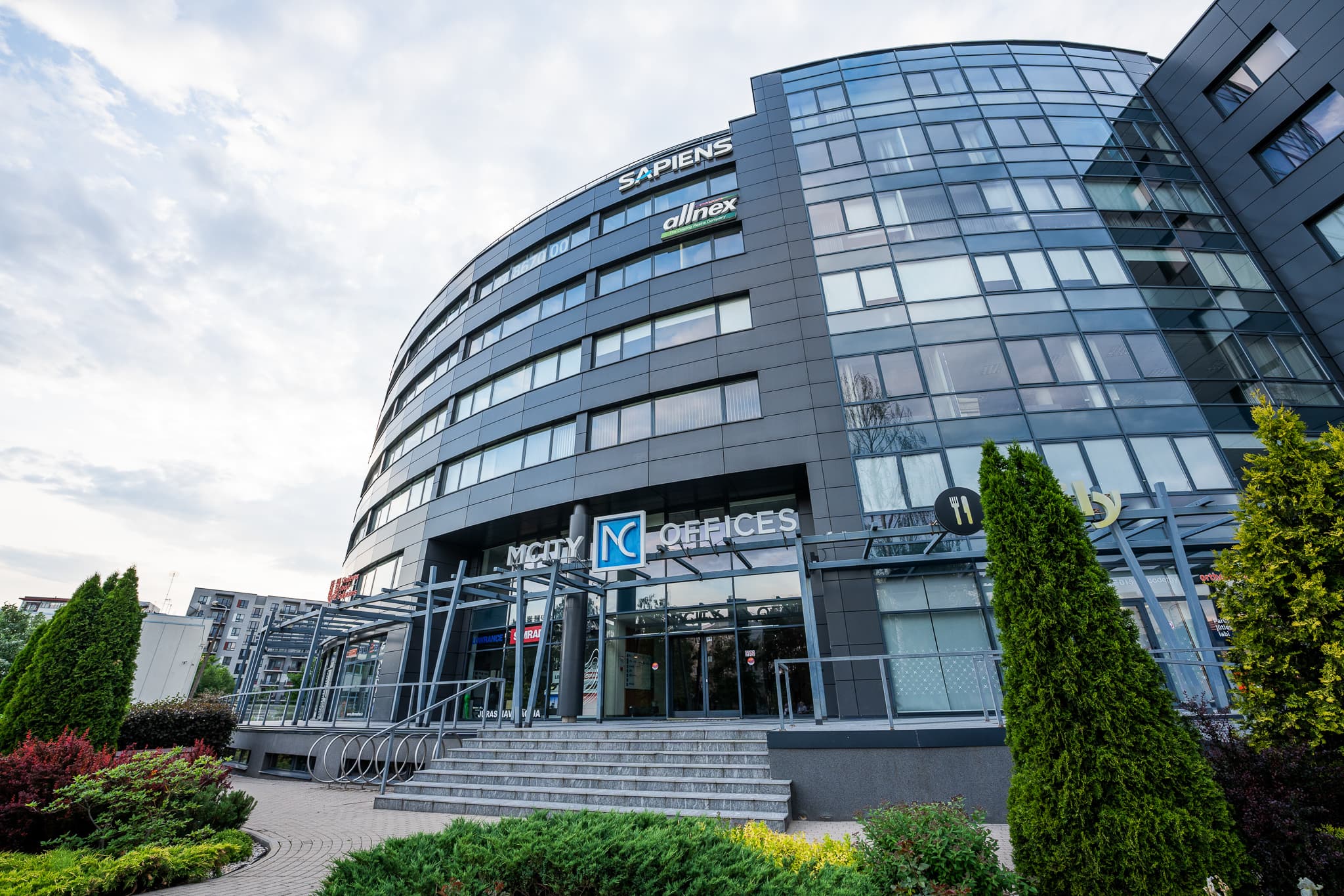 Modern business center exterior, sleek architecture