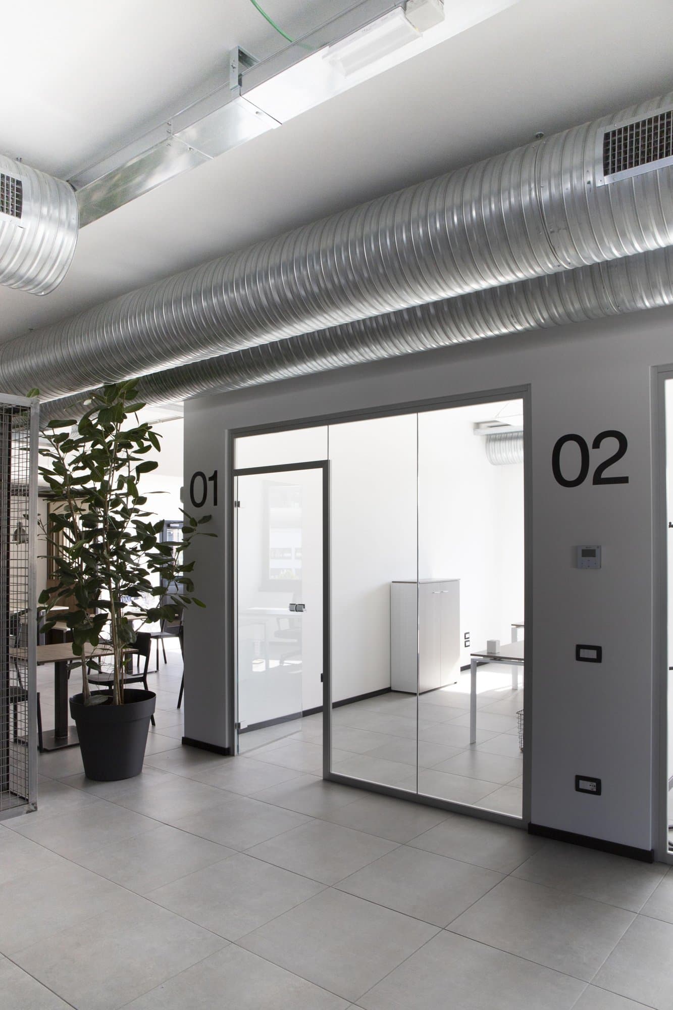 Entrance to private offices 01 and 02. Entrance to private offices 01 and 02.
