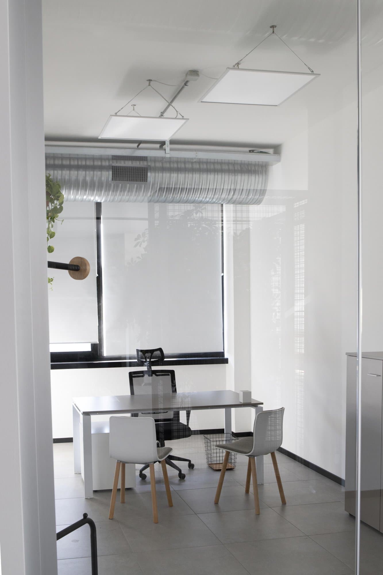 Private office with meeting table by the window. Private office with meeting table by the window.