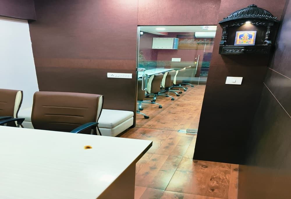 Clean & modern team workspace designed for collaboration, featuring comfortable seating and professional wood-finish flooring Clean & modern team workspace designed for collaboration, featuring comfortable seating and professional wood-finish flooring