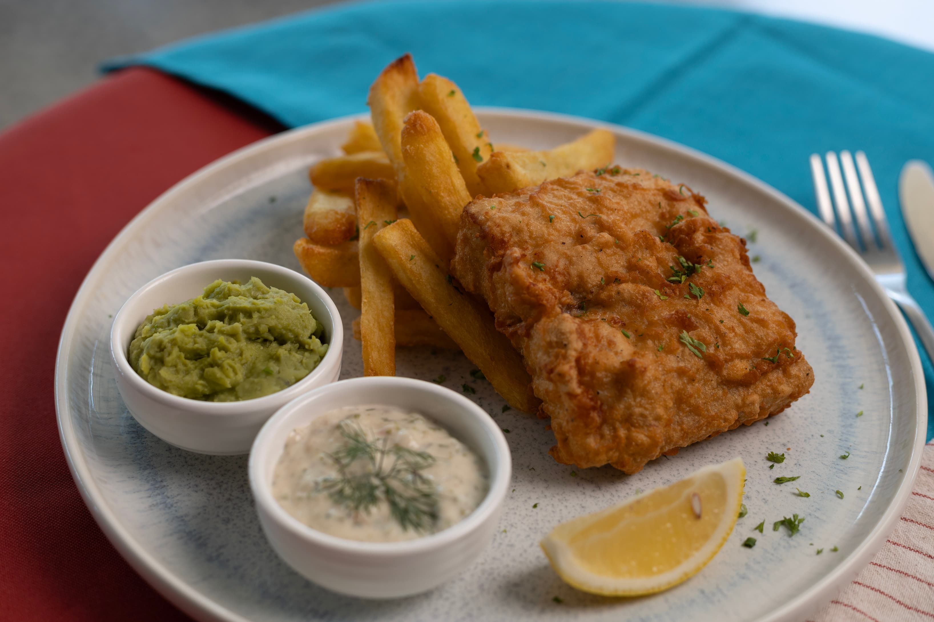 The best fish and chips in town, featuring mushy peas.
