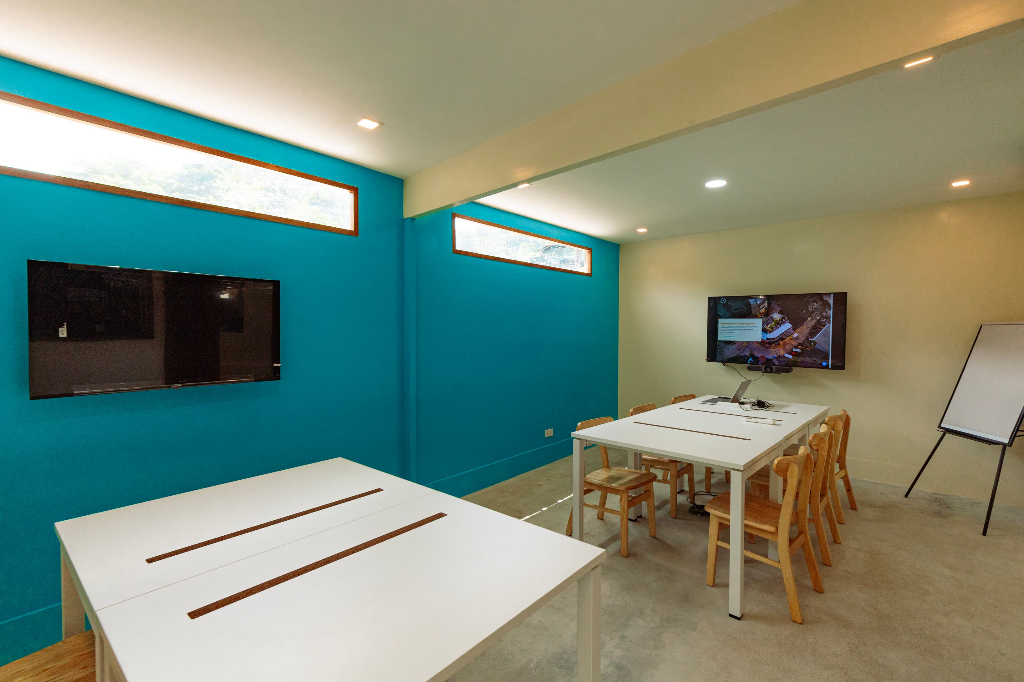 Meeting rooms with teleconferencing capabilities.