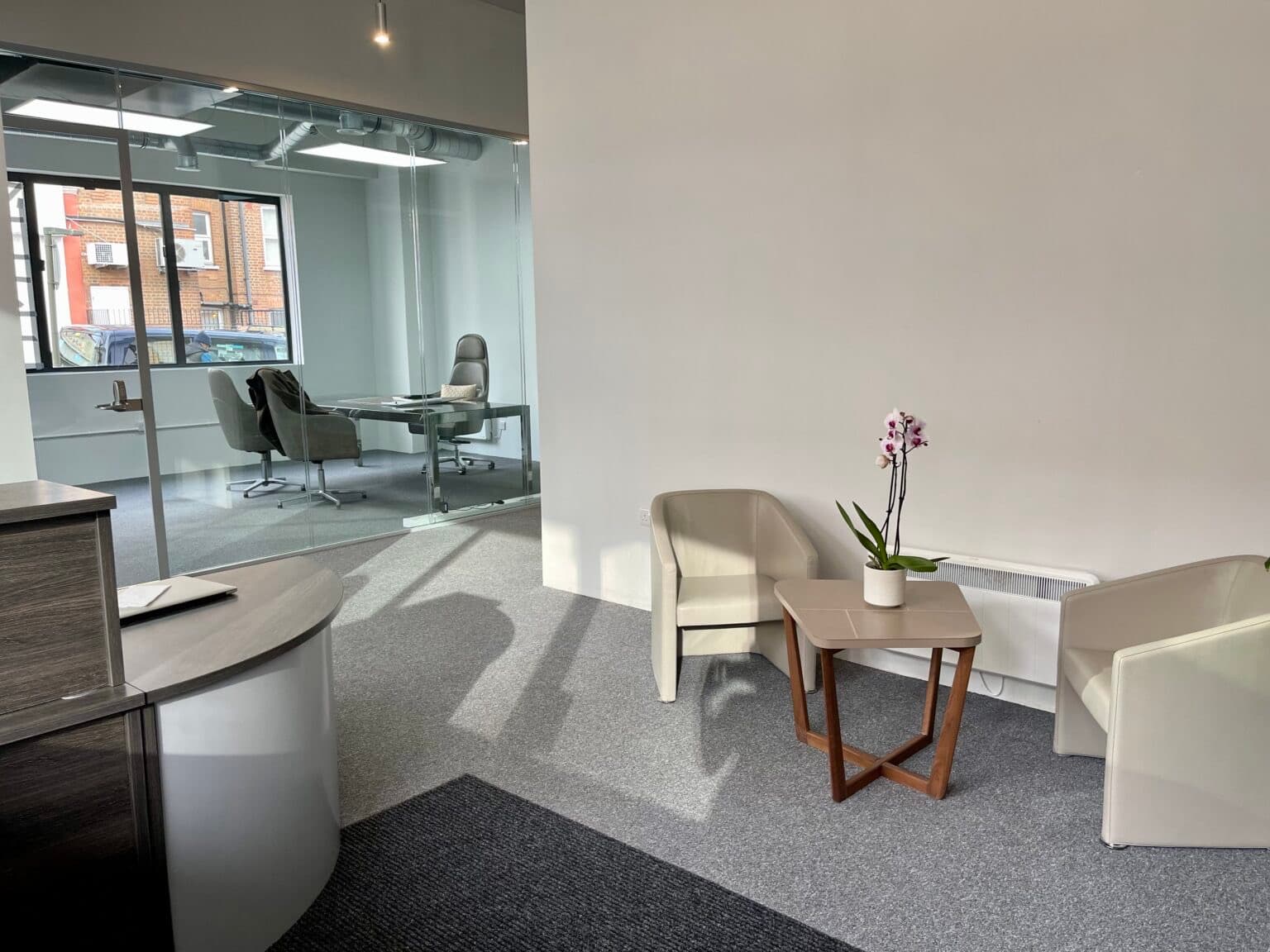 Glass-partitioned private rooms at SSV Suites, 106 Finchley Road NW3. Studio rooms to rent, North London.