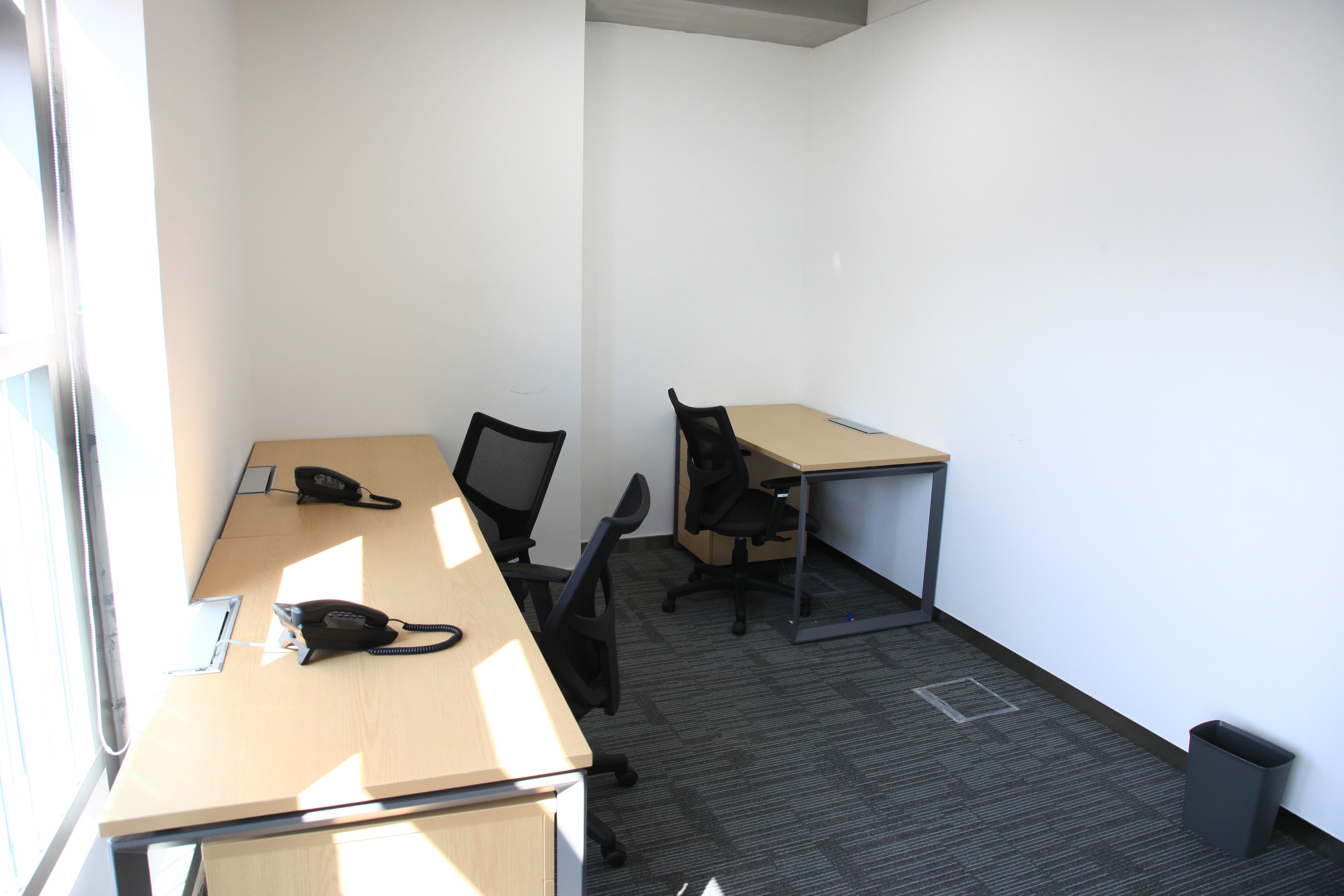 Office with city views and a wooden door 2