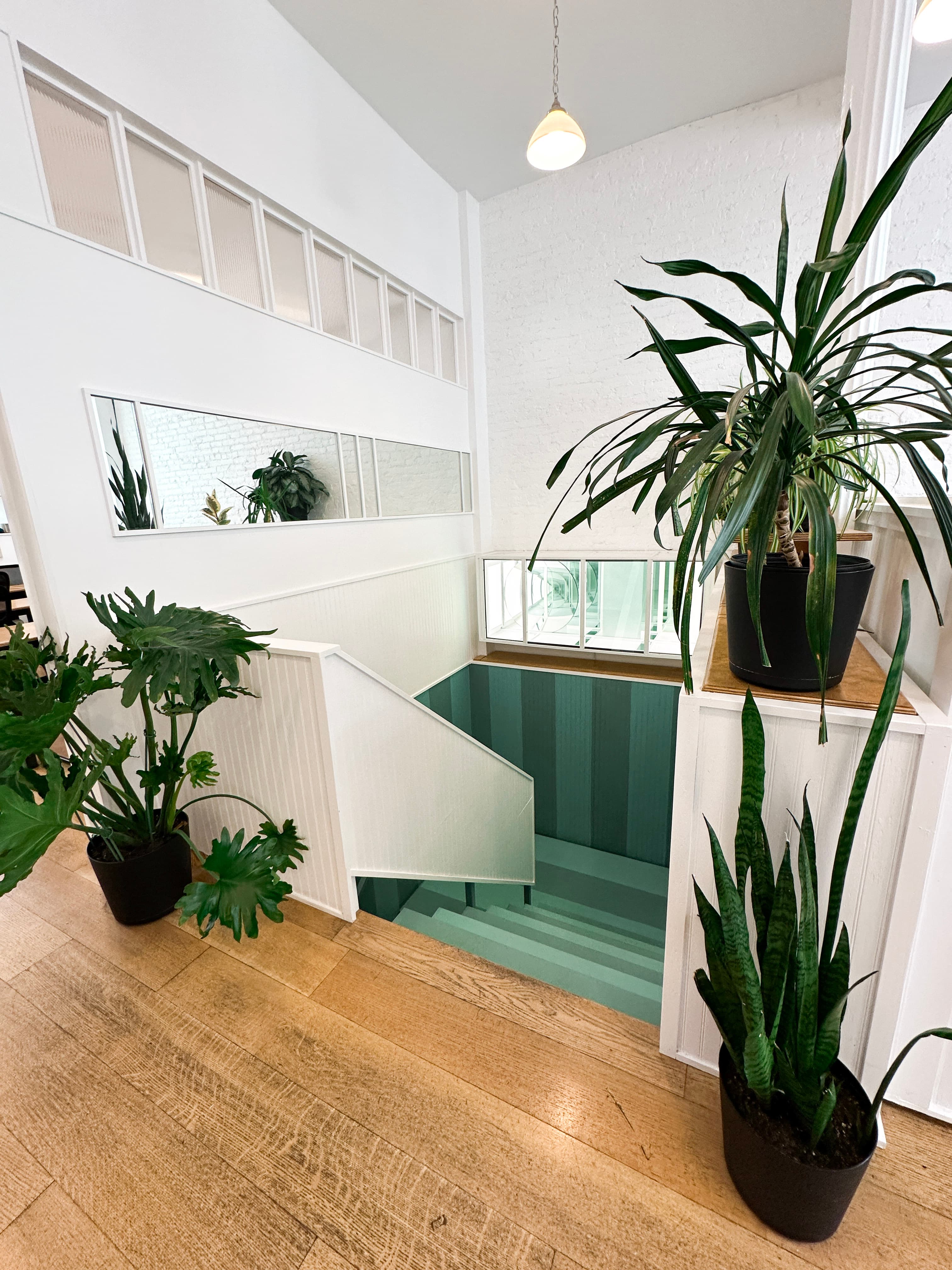 We have a lower level with conference rooms, podcast room, conference rooms, lounge, and second kitchen