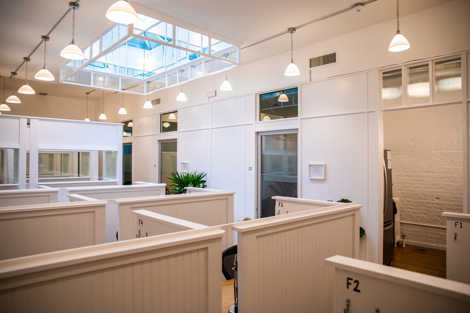 Personal desks in the main open space