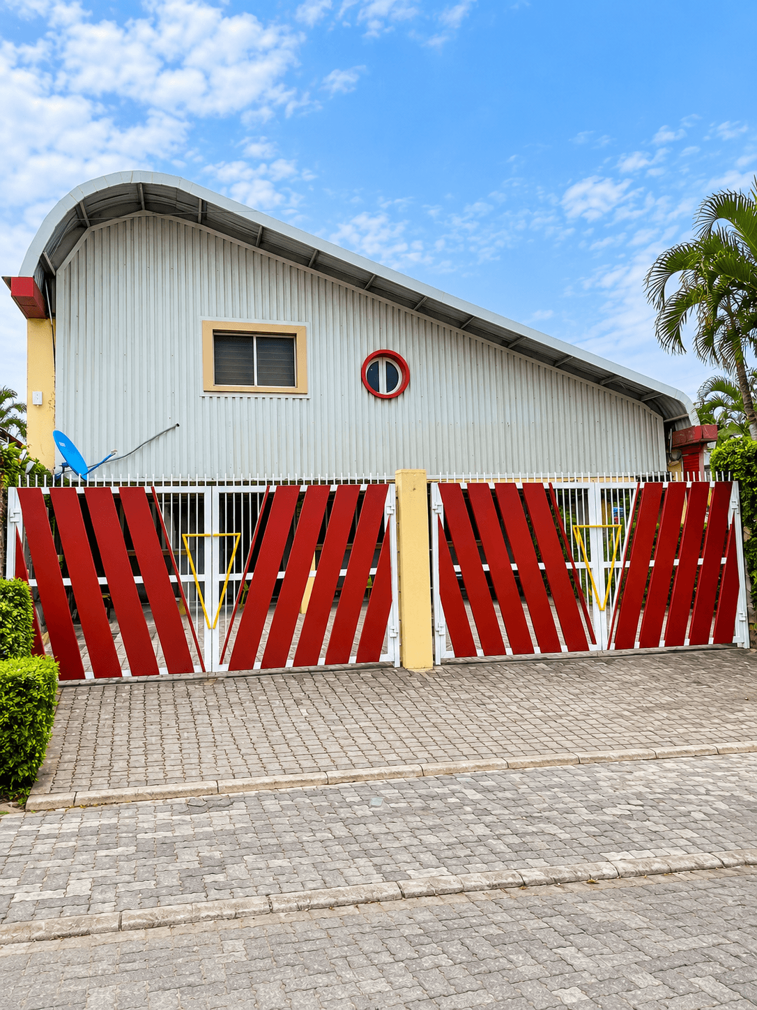 Dulowork coworking space exterior and landscaped walkway in Lekki, Lagos. Dulowork coworking space exterior and landscaped walkway in Lekki, Lagos.