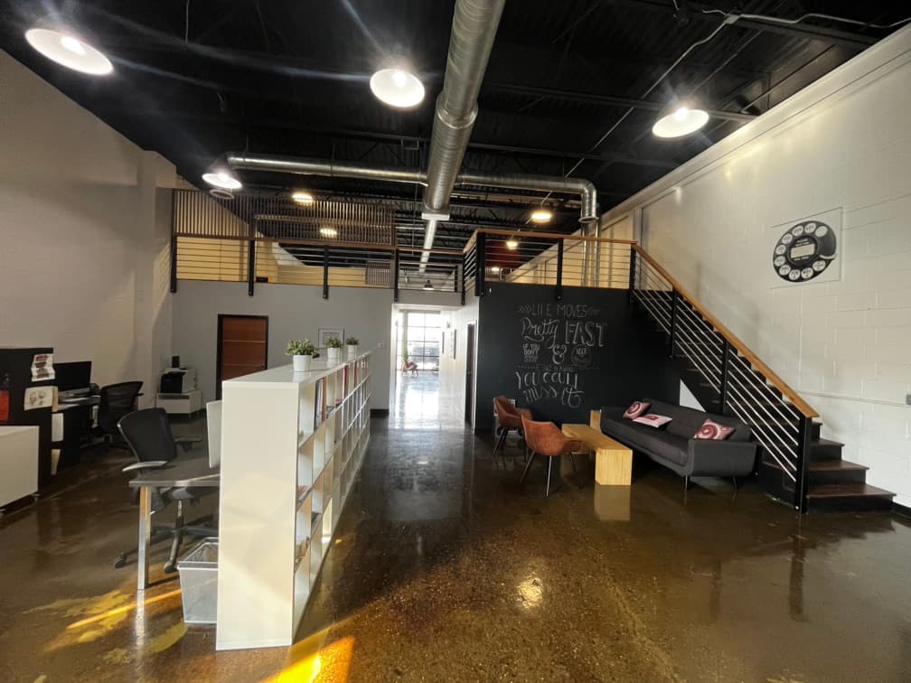 view from back of office down hallway to entrance