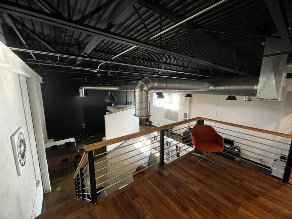 View from the loft area at the top of the stairs. 