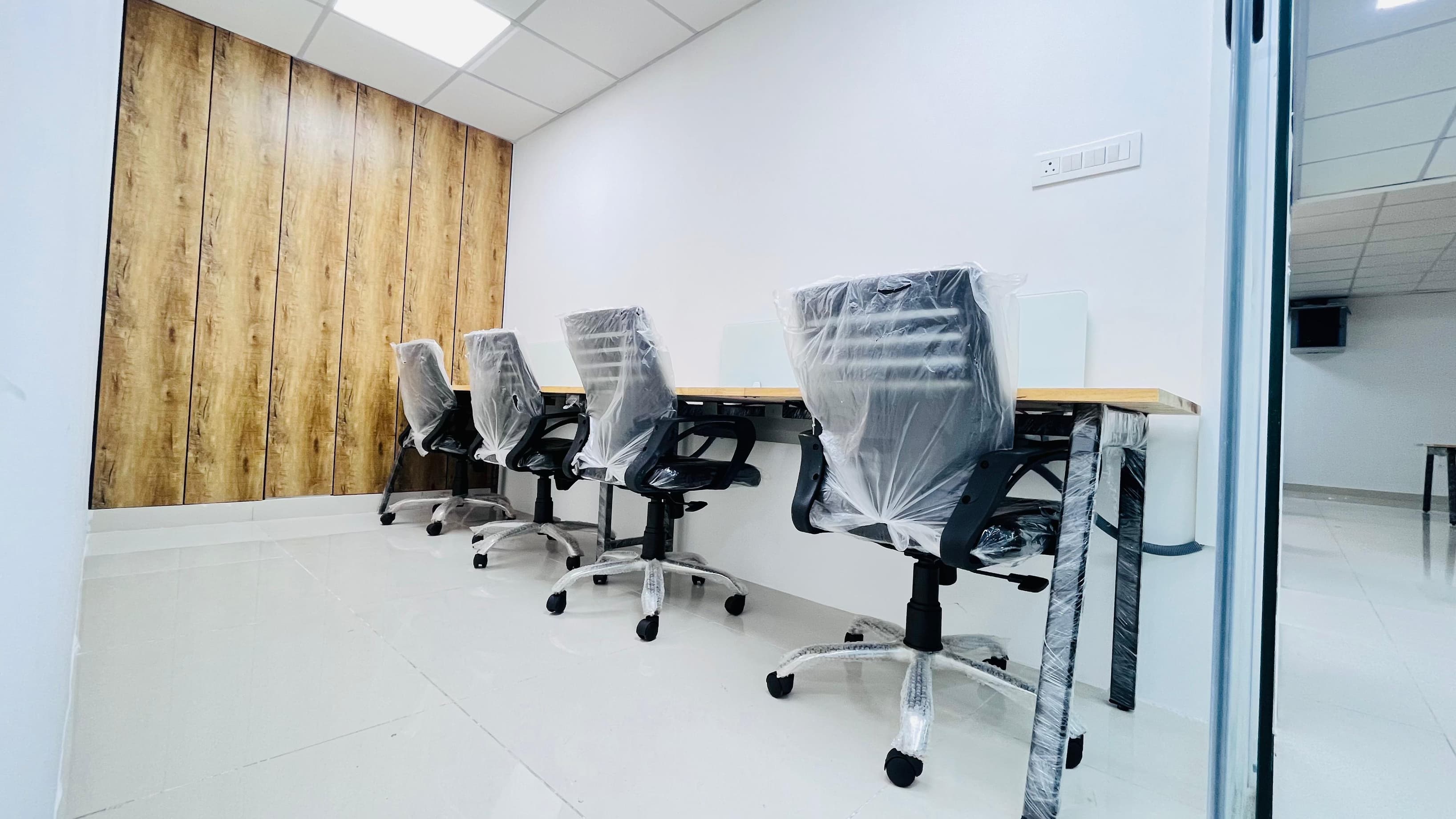 A private seater cabin ideal for small teams, offering a secure and dedicated workspace with ergonomic furniture, high-speed 