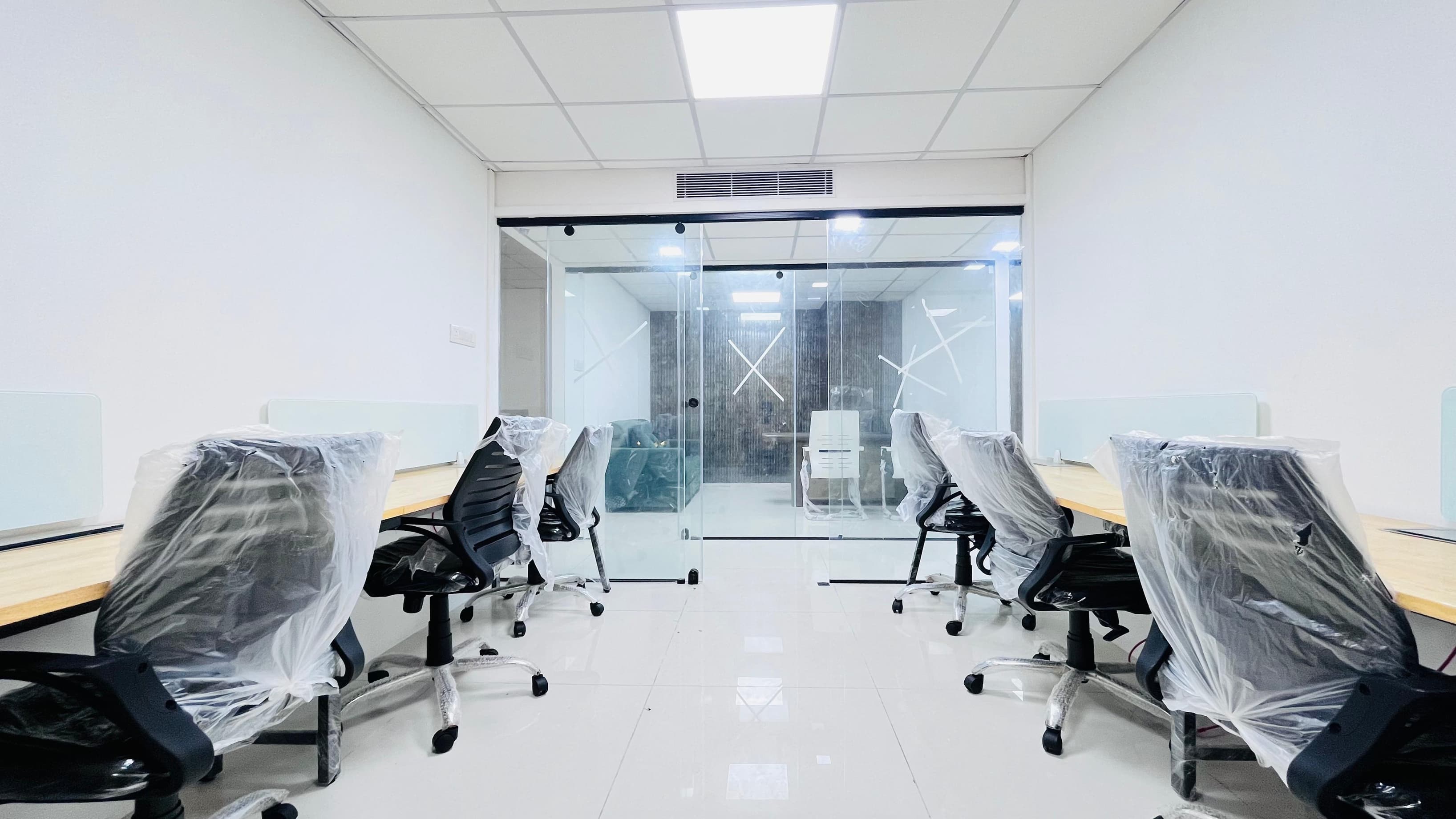 A Private seater cabin ideal for small teams, offering a secure and dedicated workspace with ergonomic furniture, high-speed 