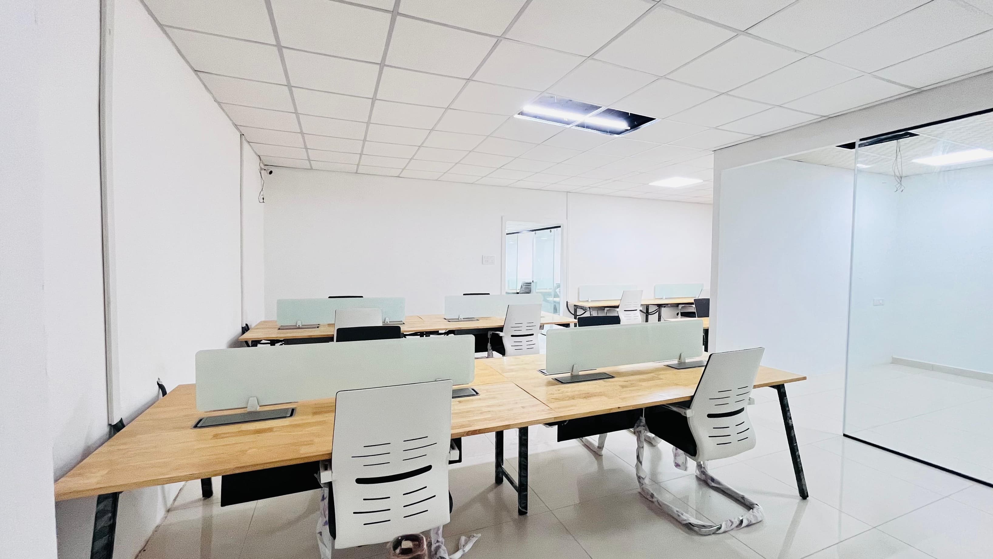 A seater cabin ideal for small teams, offering a secure and dedicated workspace with ergonomic furniture, high-speed 