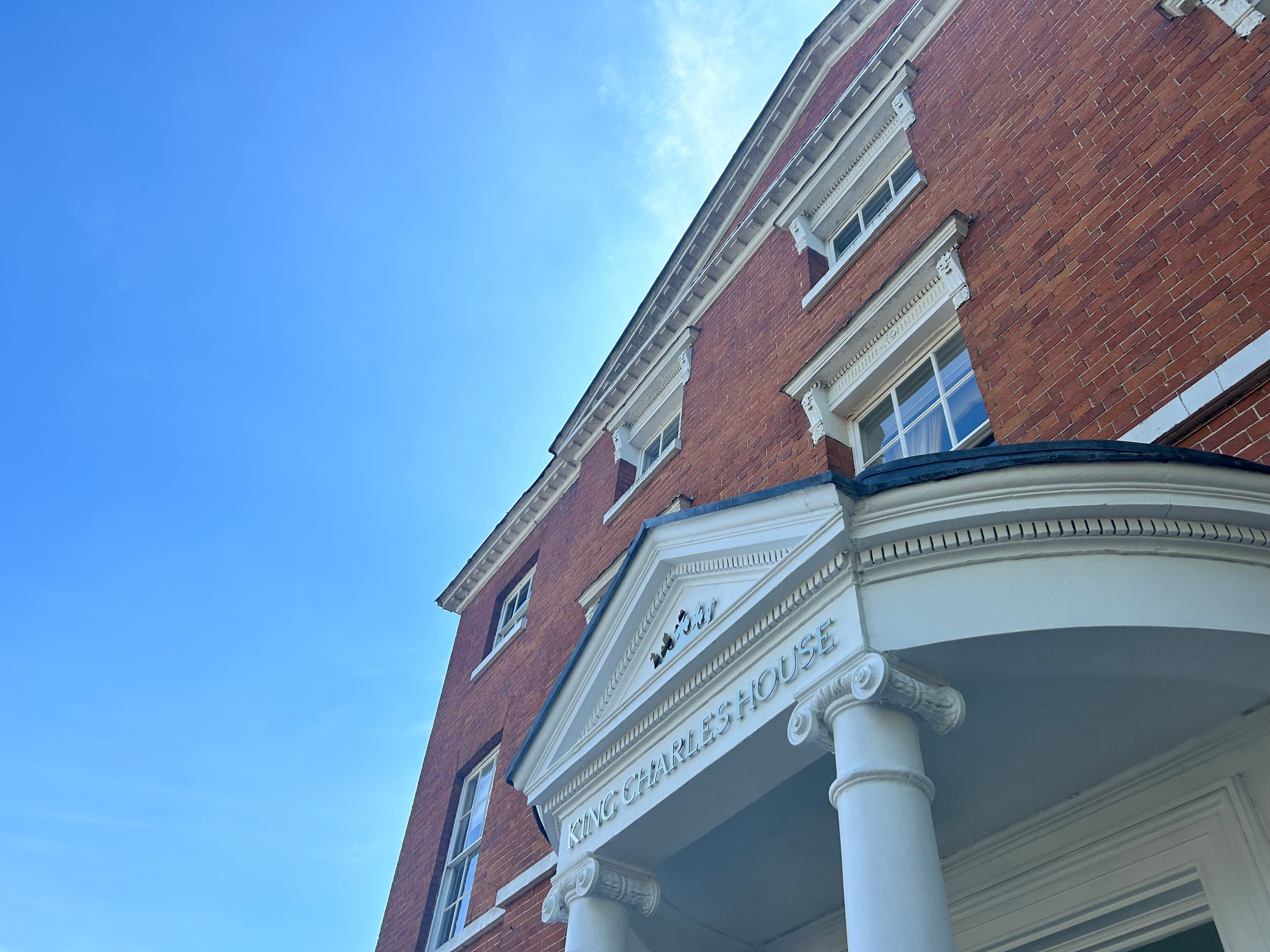 Elegant Georgian façade showcasing the character and prestige of King Charles House. Elegant Georgian façade showcasing the character and prestige of King Charles House.