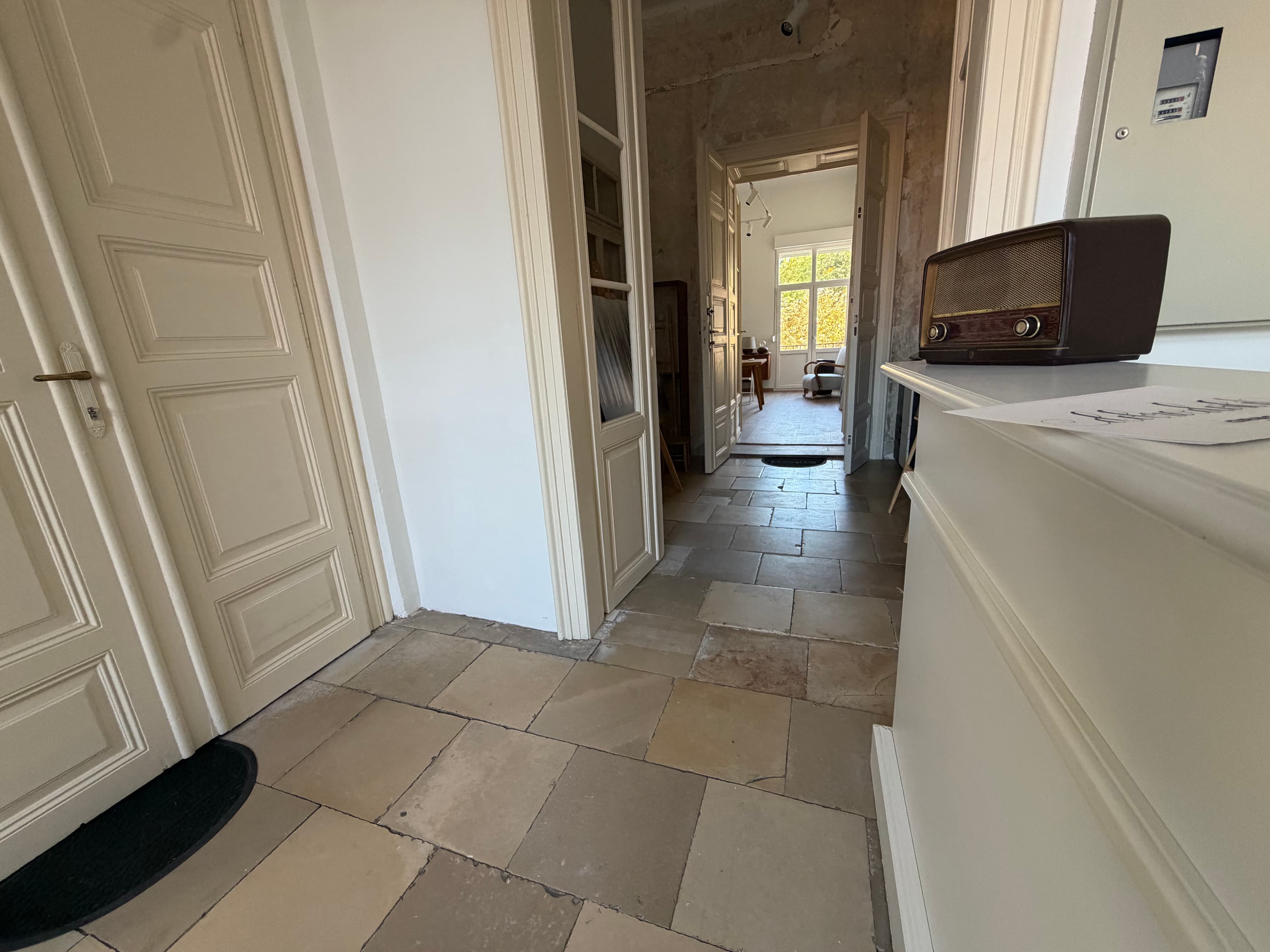 Entrance Hall Original stone floors and restored period doors welcome you into the hub.