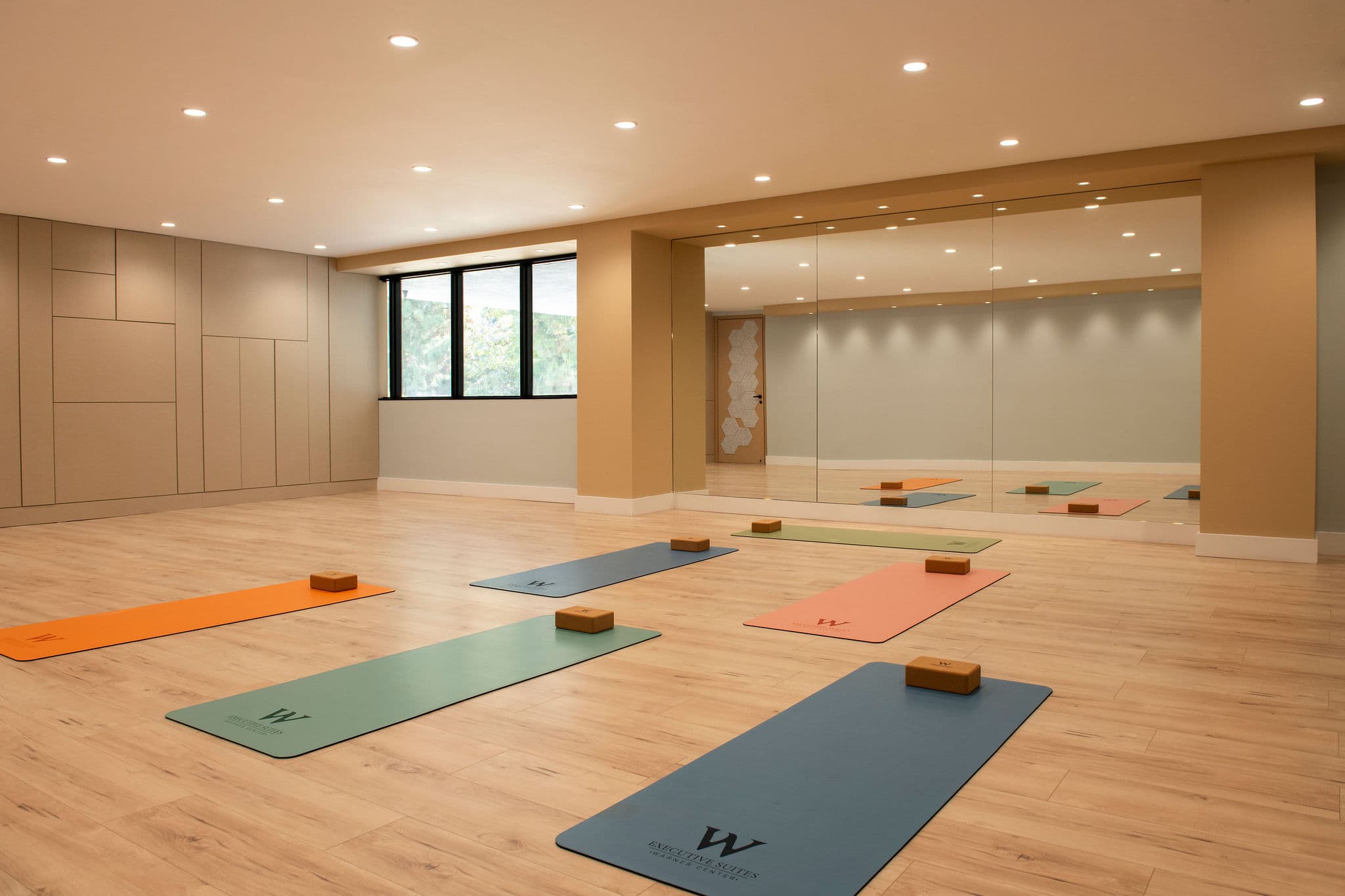 Work hard. Stretch harder. On-site yoga studio, gym, and wellness services Work hard. Stretch harder. On-site yoga studio, gym, and wellness services