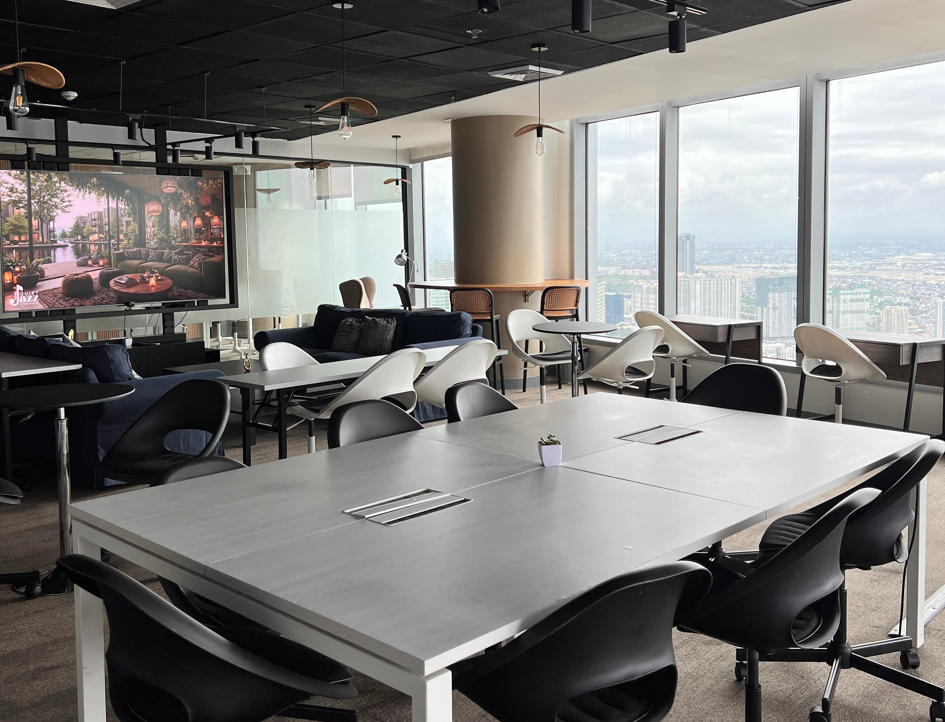 Coworking Area Capacity: 35 people Equipped with a 98-inch TV Furnished with a comfortable cloud sofa Coworking Area Capacity: 35 people Equipped with a 98-inch TV Furnished with a comfortable cloud sofa