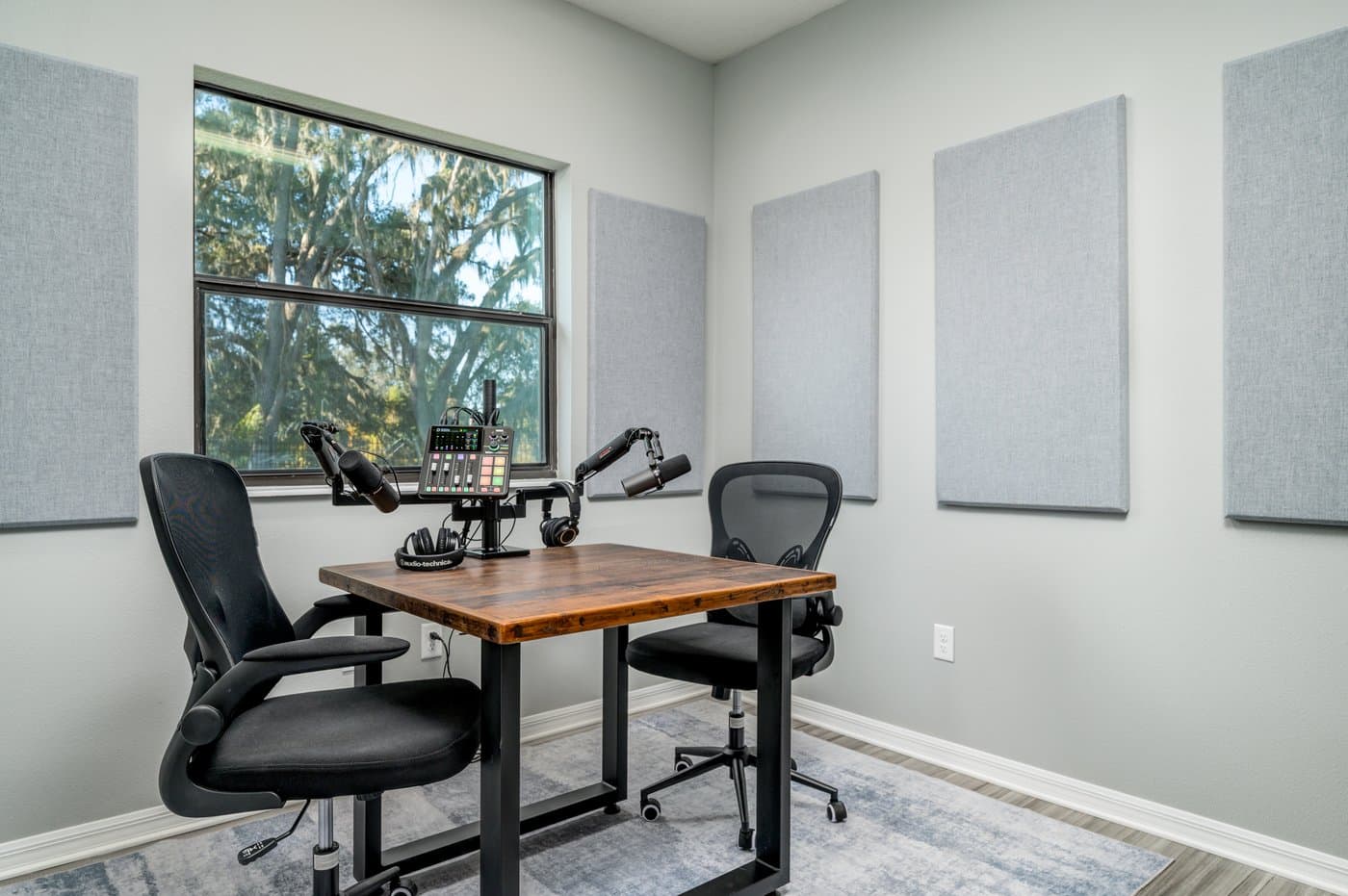 Podcast studio with Shure SM7B microphones and a sound-treated room, bookable by the hour. Podcast studio with Shure SM7B microphones and a sound-treated room, bookable by the hour.