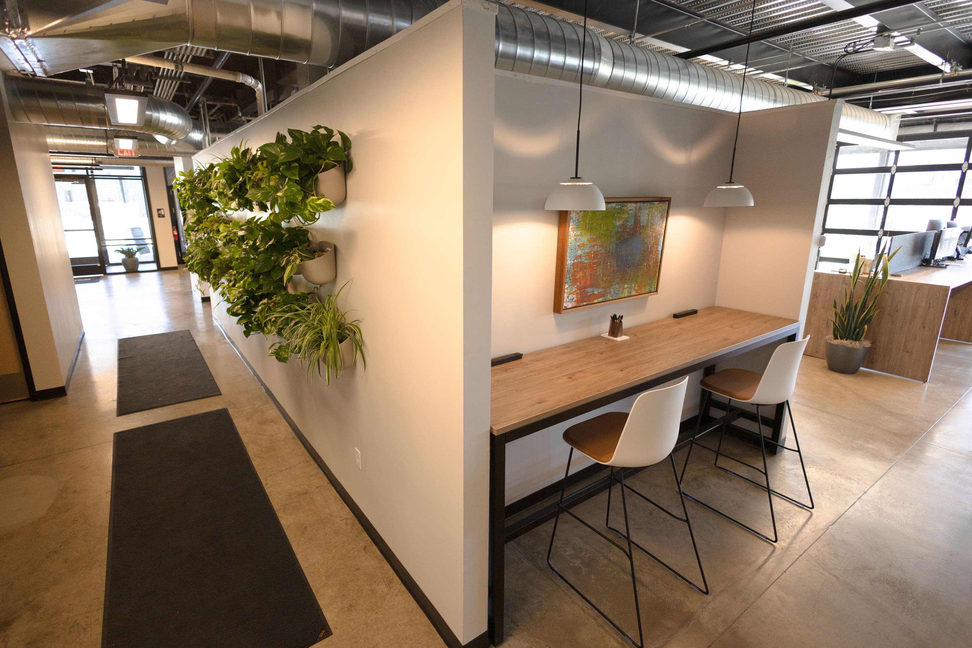 Living wall and shared workspace Living wall and shared workspace