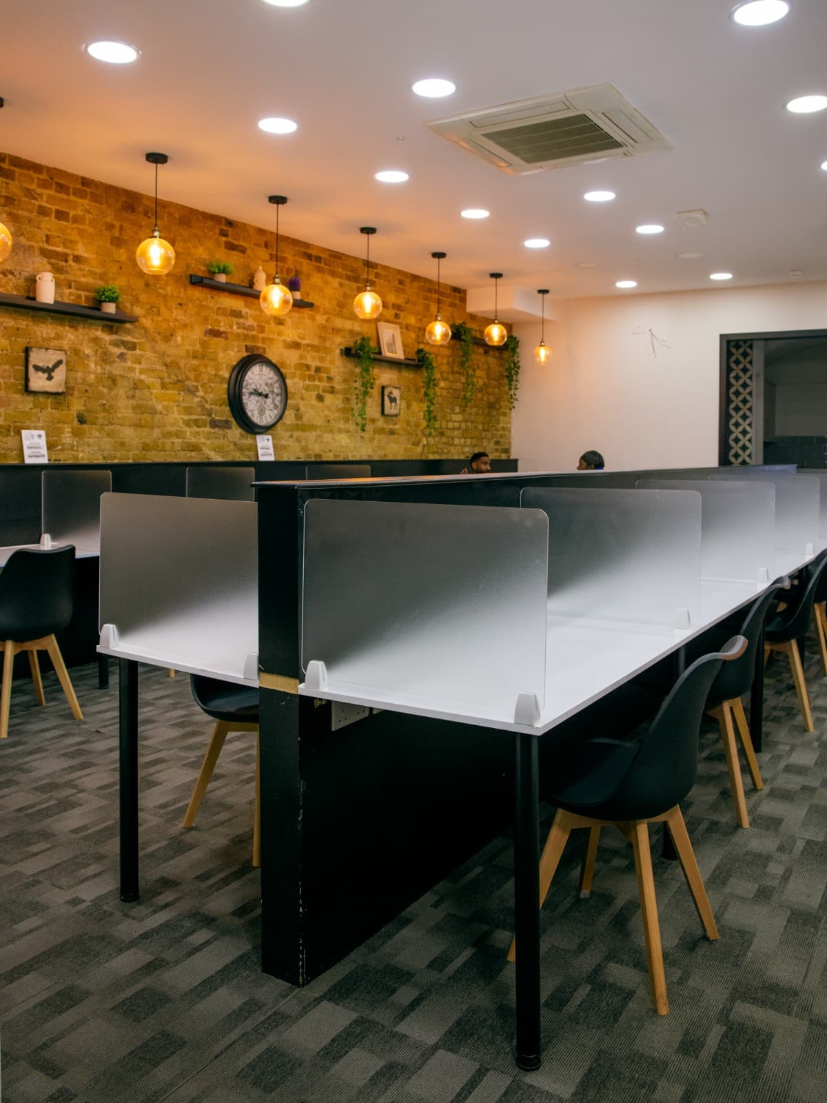 Seating area: Comfortable work desks and cozy lounge seating available Seating area: Comfortable work desks and cozy lounge seating available