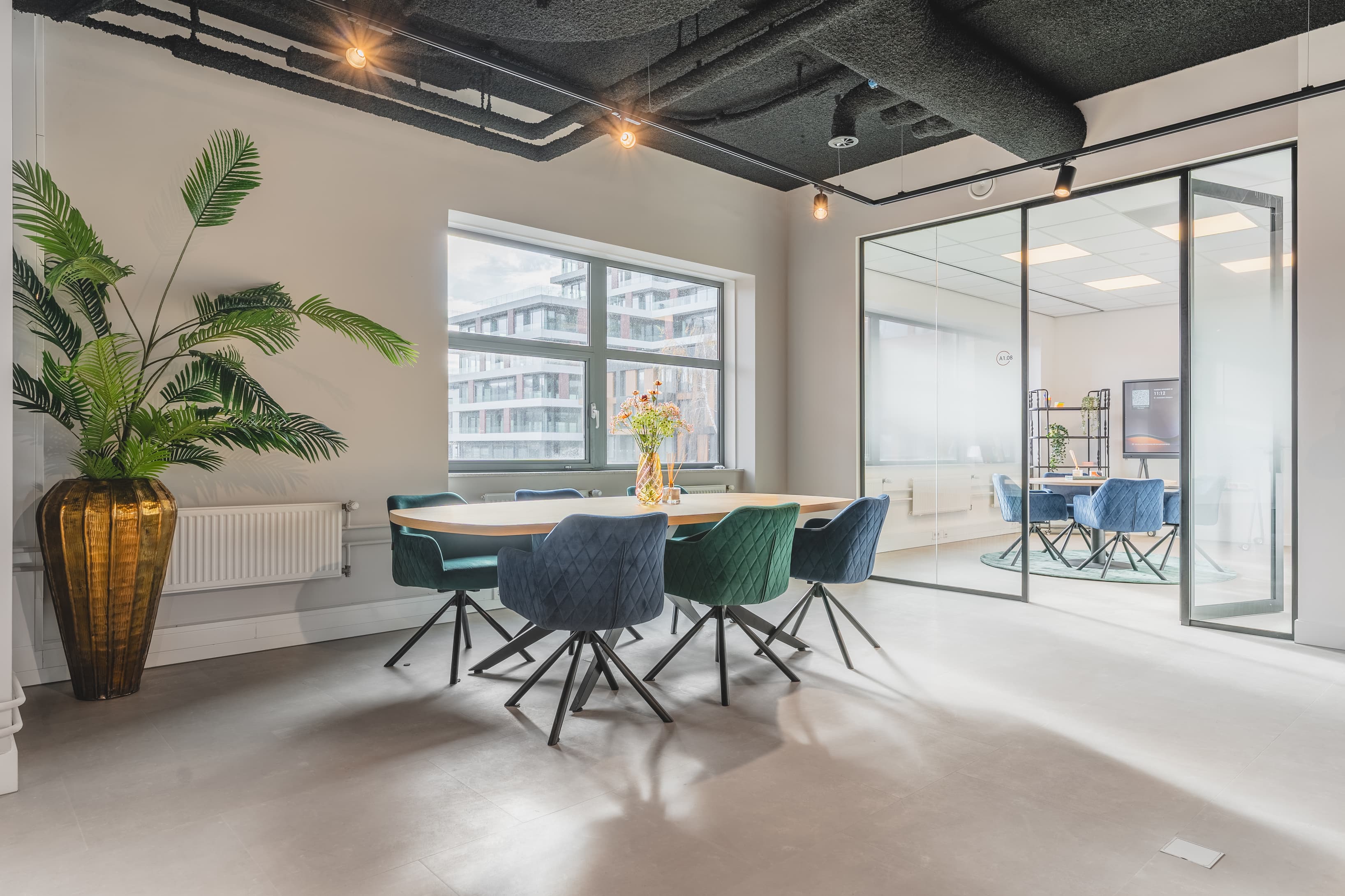 Welcoming seating area in The Space with comfortable chairs and plenty of natural light, ideal for coffee breaks Welcoming seating area in The Space with comfortable chairs and plenty of natural light, ideal for coffee breaks