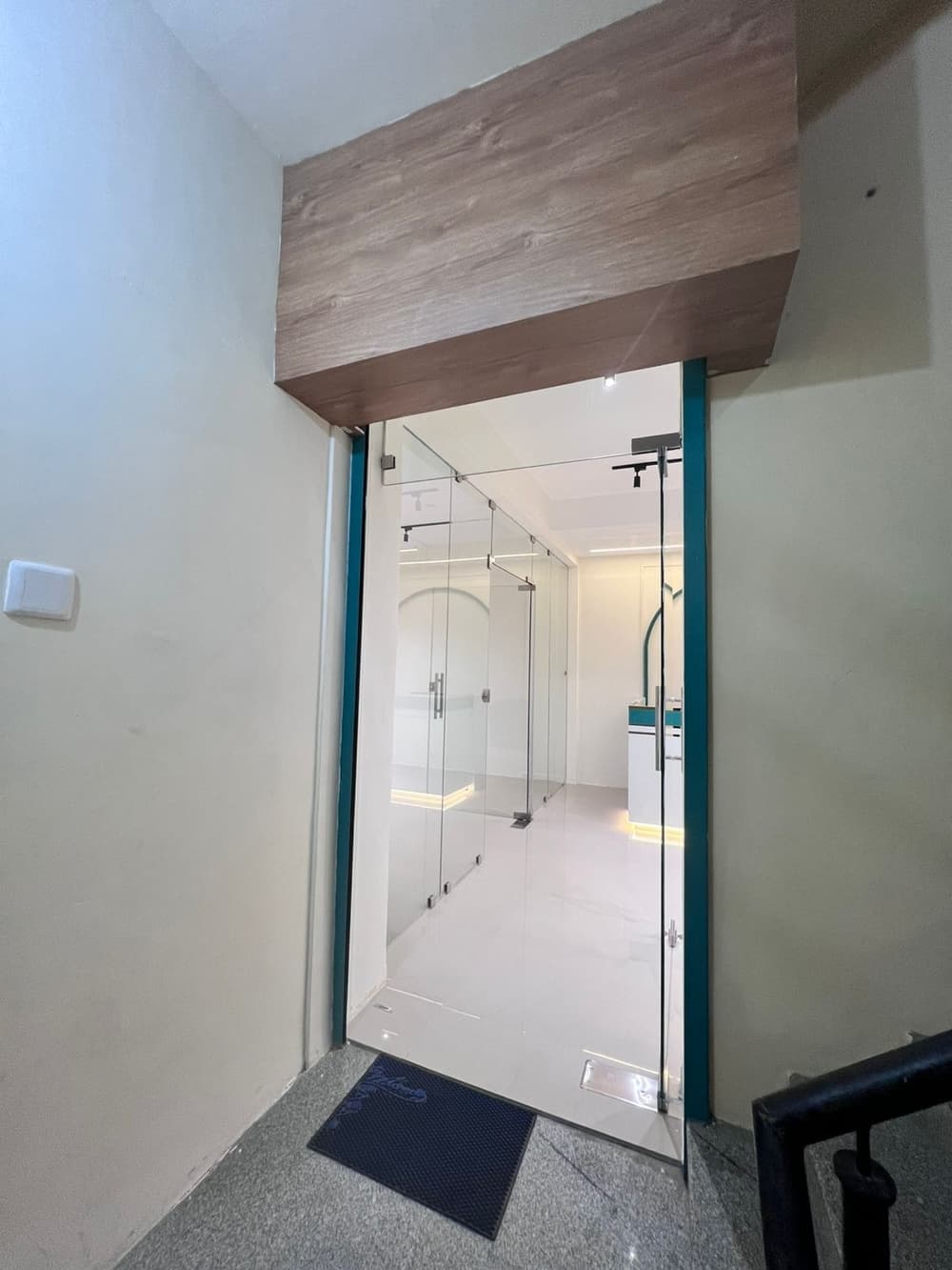 Modern glass entrance with secure access Modern glass entrance with secure access