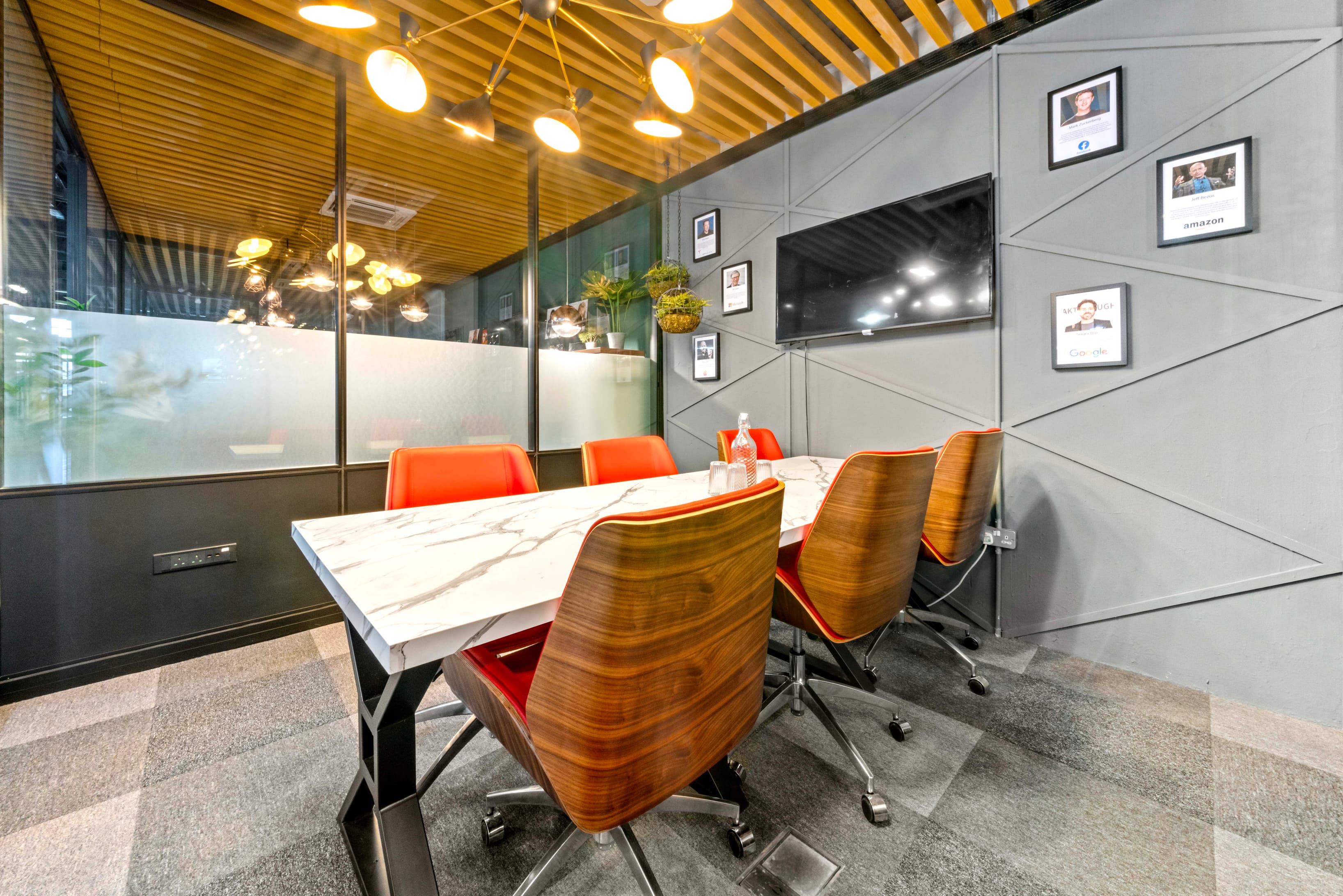 Modern meeting room with comfortable seating, ideal for team discussions, client meetings, and collaborative work sessions in Modern meeting room with comfortable seating, ideal for team discussions, client meetings, and collaborative work sessions in