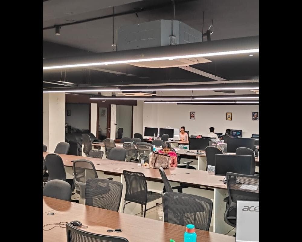 Open workspace at Ecowrkz Coimbatore featuring organized desk setups Open workspace at Ecowrkz Coimbatore featuring organized desk setups