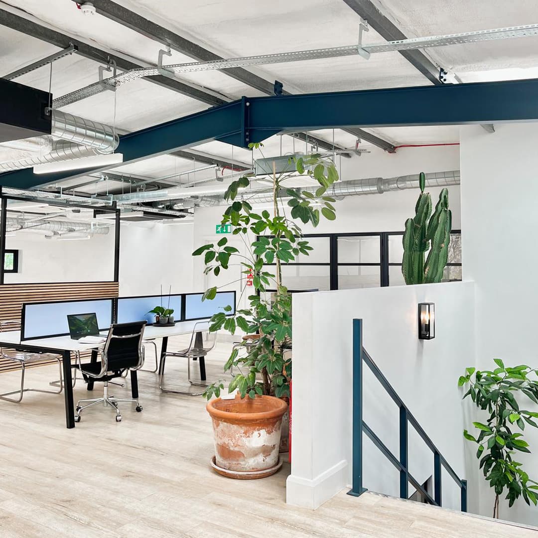 Dedicated desks on mezzanine floor Dedicated desks on mezzanine floor
