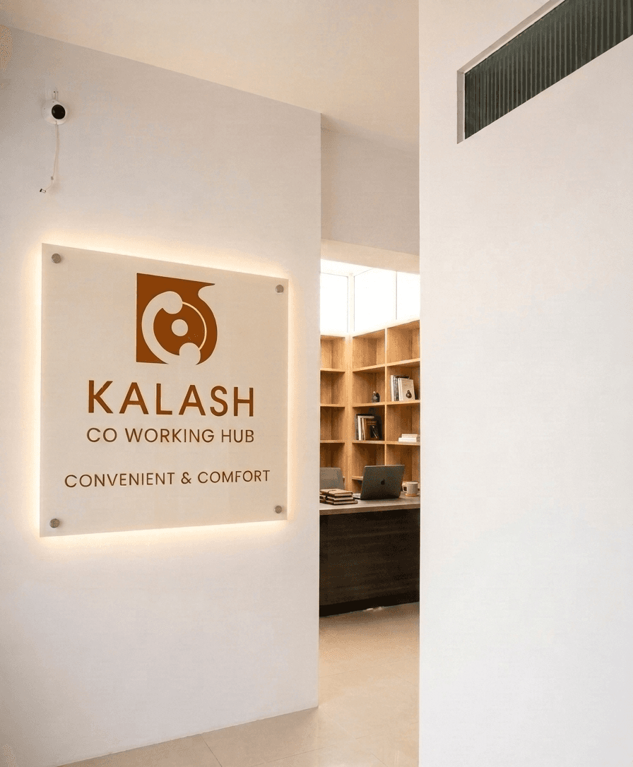 Welcoming entrance with branded signage and a warm reception desk. Welcoming entrance with branded signage and a warm reception desk.