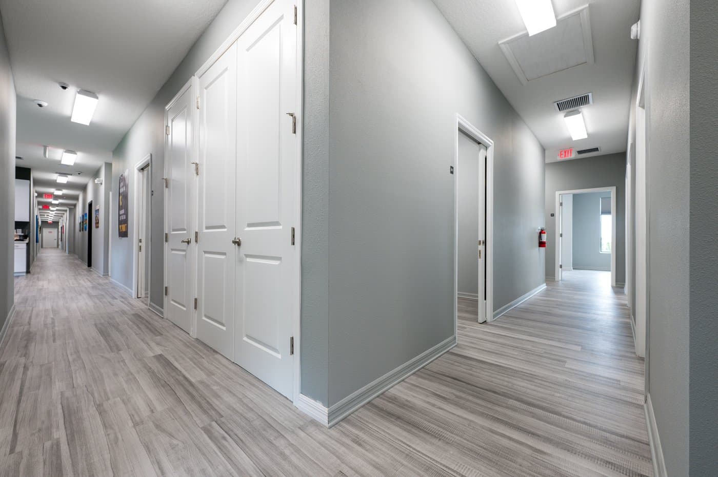 Quiet hallway lined with lockable private offices. Quiet hallway lined with lockable private offices.