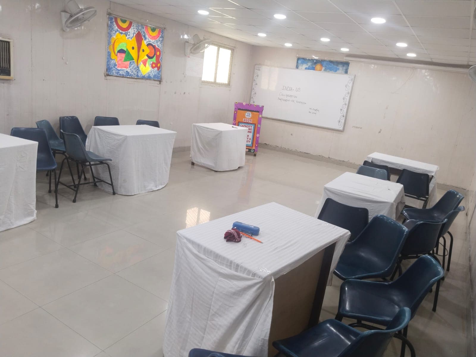 Main view of the seminar hall showing seating arrangements Main view of the seminar hall showing seating arrangements