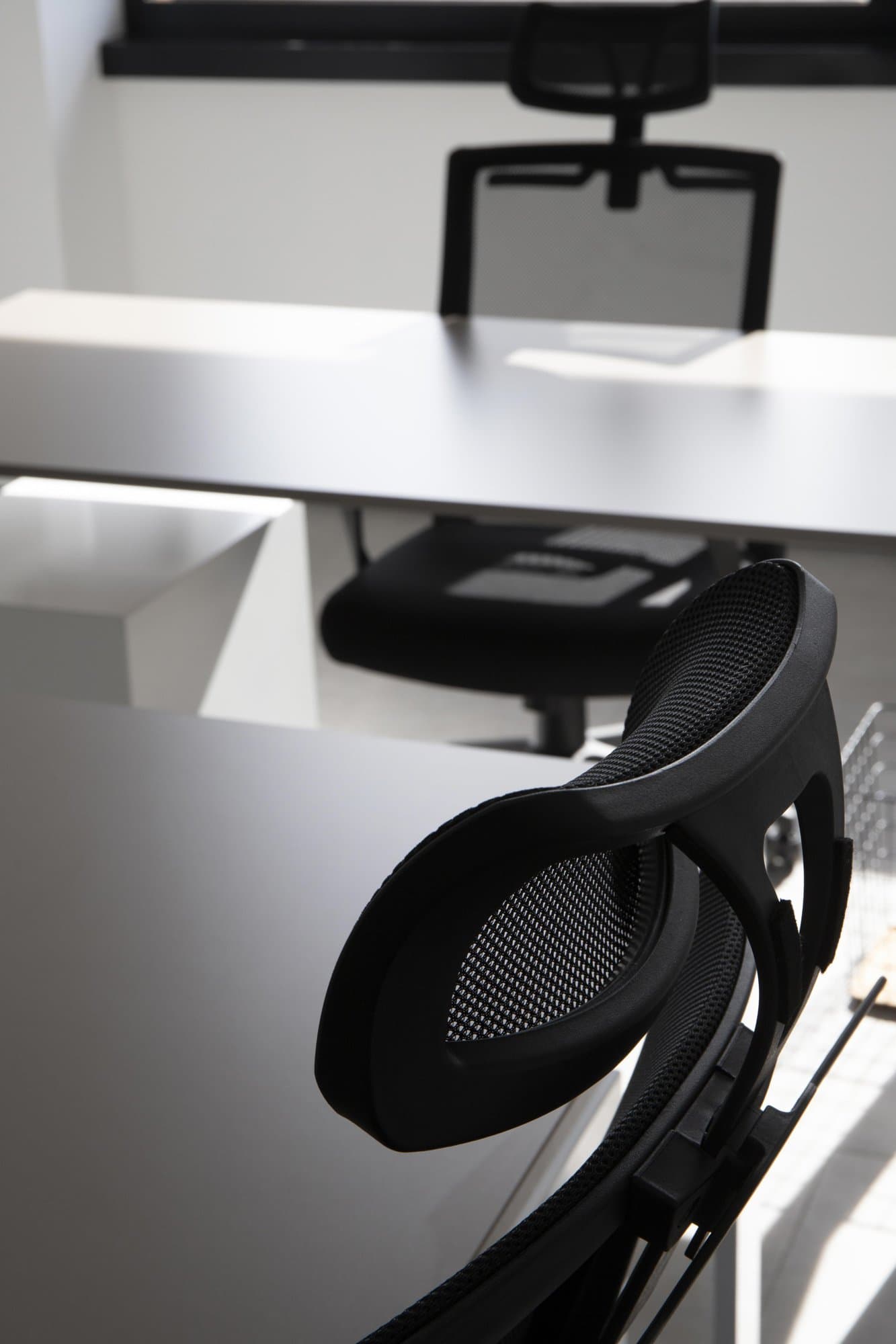 Office desk with ergonomic mesh chair. Office desk with ergonomic mesh chair.