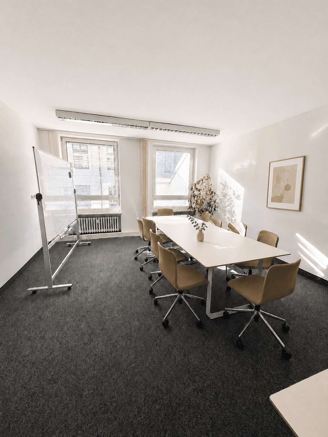 A bright, welcoming space with natural light and comfy seating, perfect for focused meetings. A bright, welcoming space with natural light and comfy seating, perfect for focused meetings.
