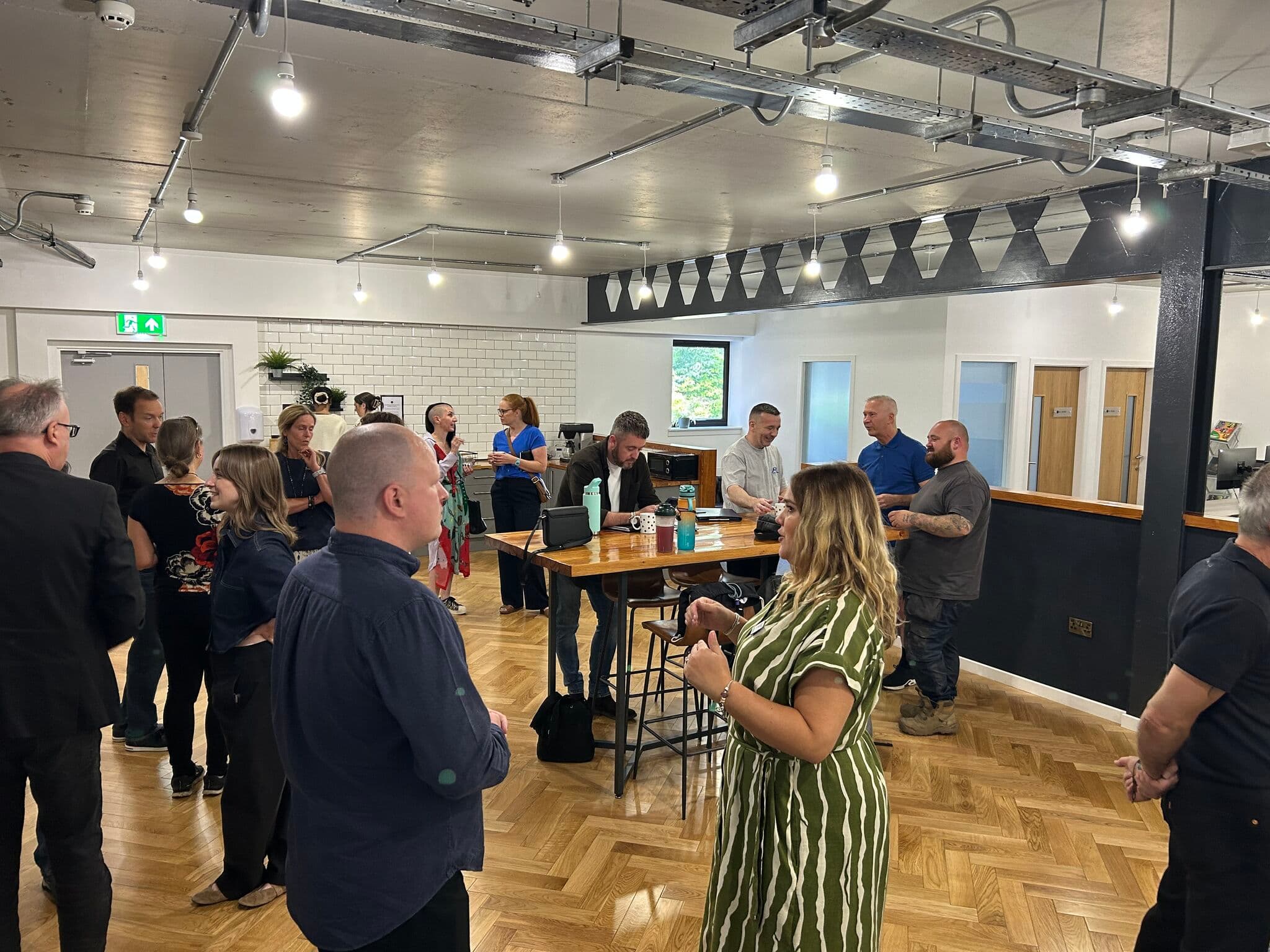 A networking event in full swing in our main kitchen and breakout area. A networking event in full swing in our main kitchen and breakout area.