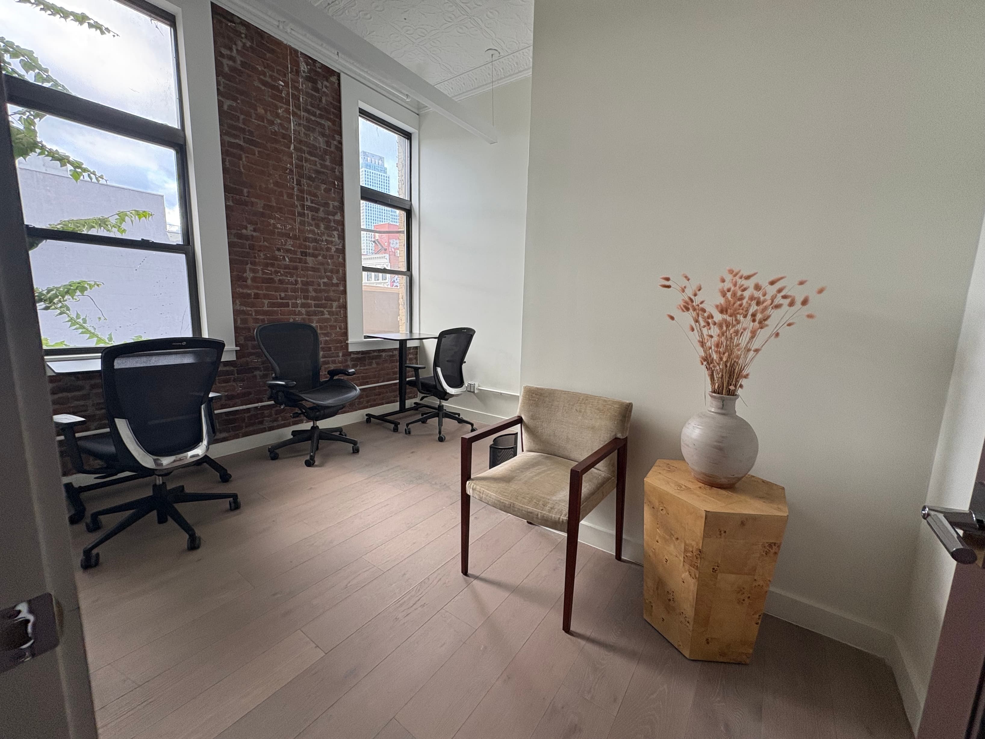 Office with small table and chairs Office with small table and chairs
