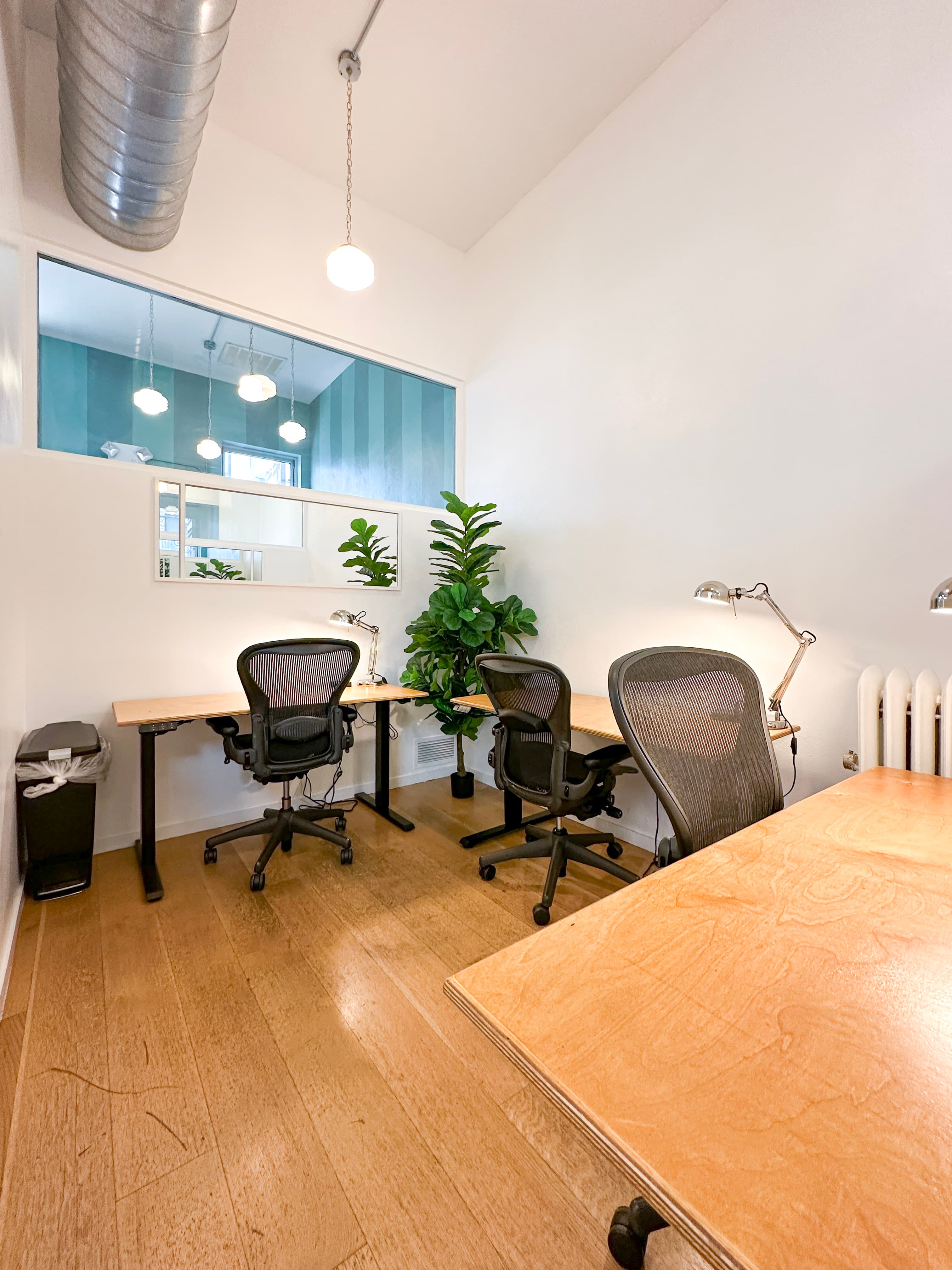 3 Person private office with high ceilings and natural light 3 Person private office with high ceilings and natural light