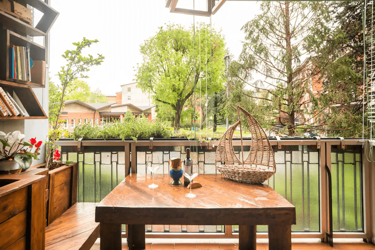 The private patio with access from the room/living room and furnished with restored wood. The private patio with access from the room/living room and furnished with restored wood.